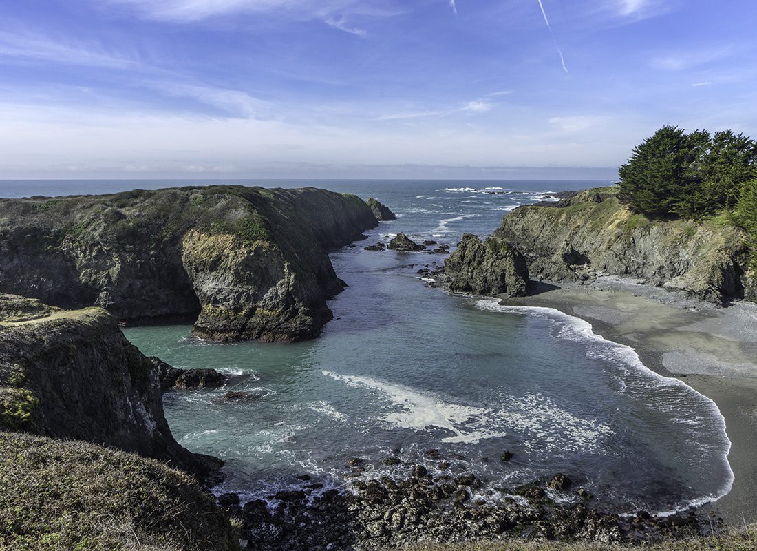 Fort Bragg, CA Insurance - Beautiful High View of the California Shoreline, Waves Breaking Against Rocks